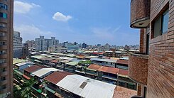 我是接案人 永和愛買 熱鬧商圈 讓利公寓價買電梯房