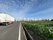 新吉村莊旁面寬農地